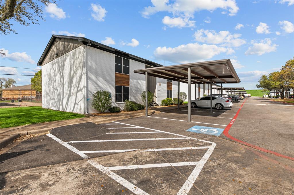 Community covered parking at The Ashton on 287. Community view, not the specific exterior or interior of this unit. Covered parking is optional; confirm availability and charges. Community covered parking at The Ashton on 287. Community view, not the specific exterior or interior of this unit. Covered parking is optional; confirm availability and charges.