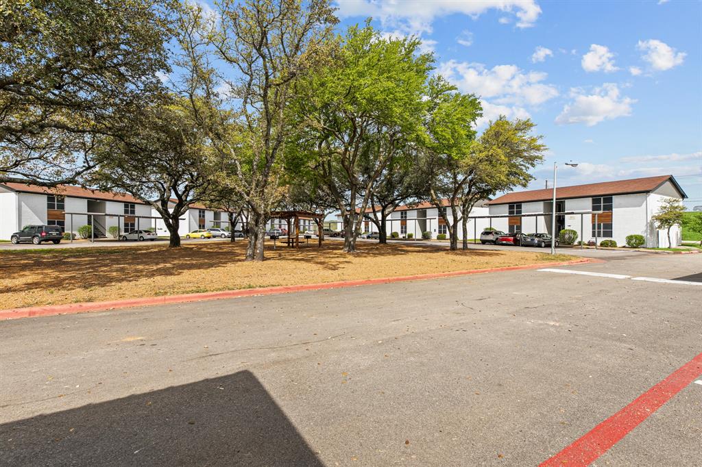 Community grounds and courtyard at The Ashton on 287. Community view, not the specific exterior or interior of this unit. Community grounds and courtyard at The Ashton on 287. Community view, not the specific exterior or interior of this unit.