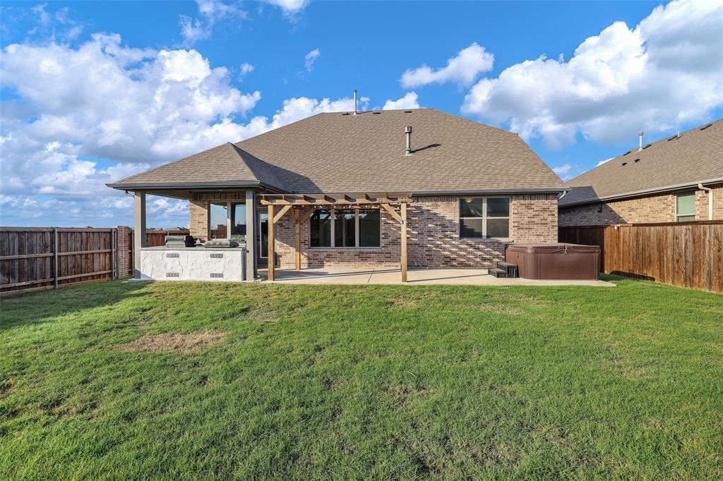 Covered and extended outdoor living with spa