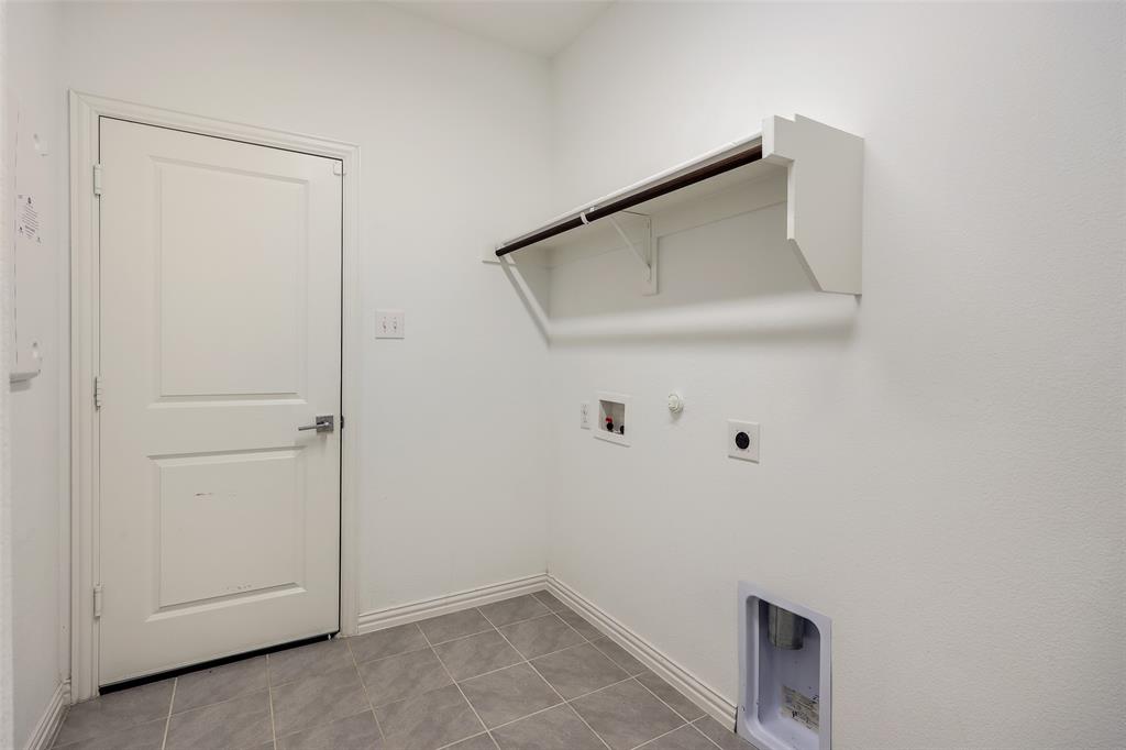 Large laundry room with room for fridge