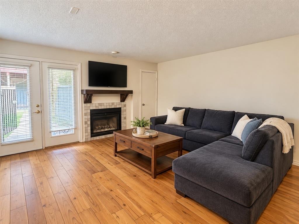 13x15 Living room with fieplace.