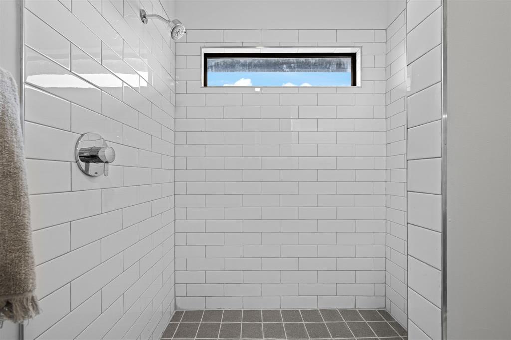 A walk-in shower completes the guesthouse’s private full bath.