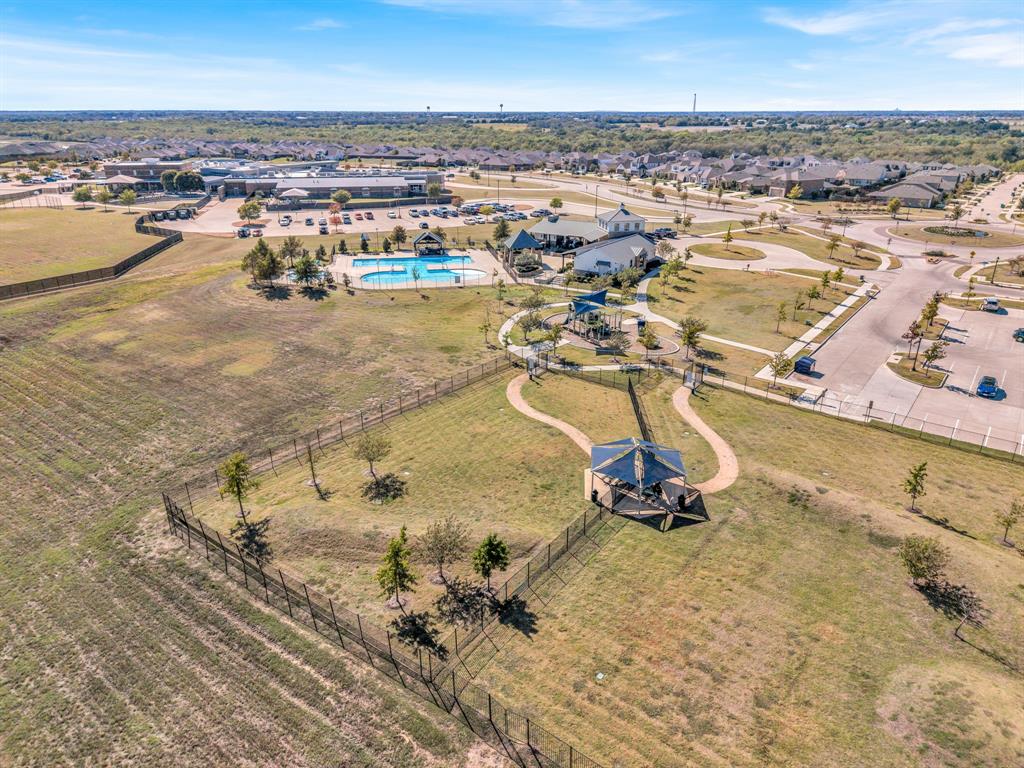 Elementary School is shown at the top of this photo, on the other side of the community center.