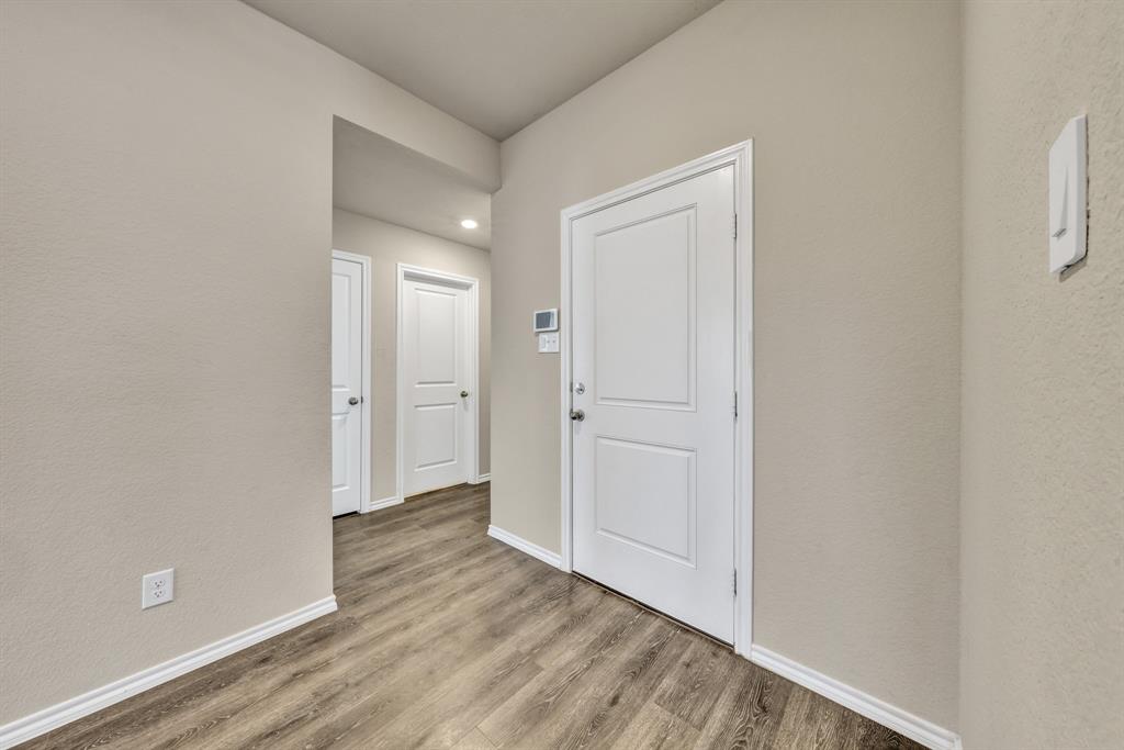 Entry area - two bedrooms on the left and one bedroom on the right