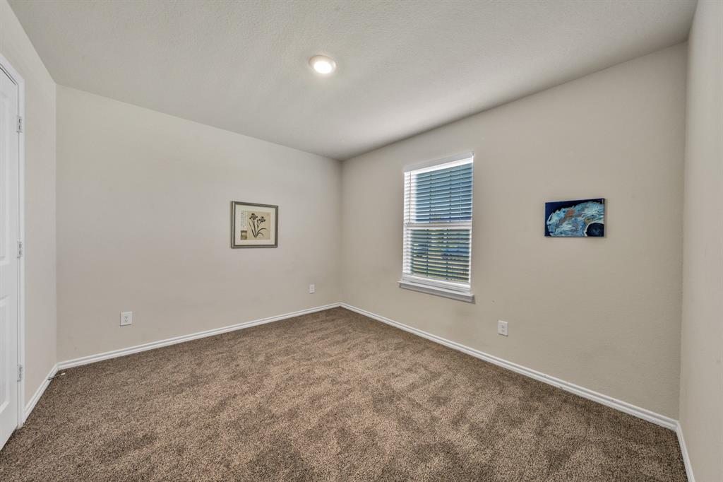 Other Bedroom has view of front yard