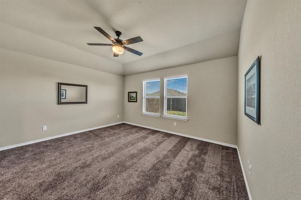 Primary Bedroom overlooks the back yard