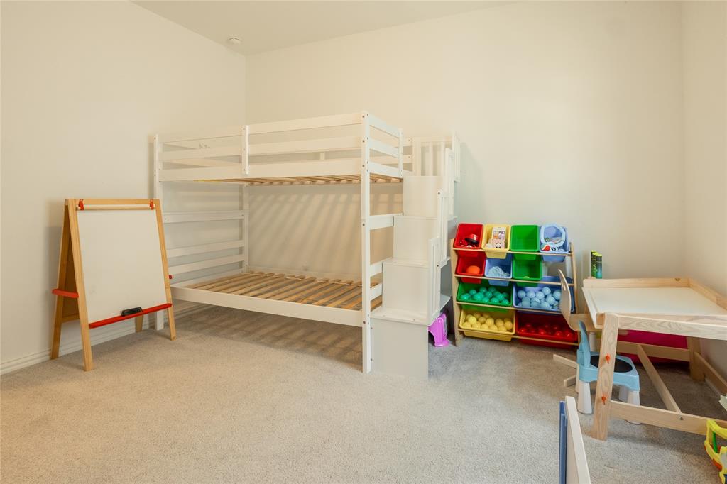 Room featuring neutral wall tones and neutral carpeting