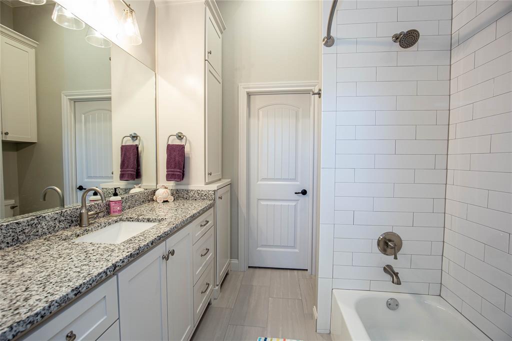 large bathroom with walk-in closet