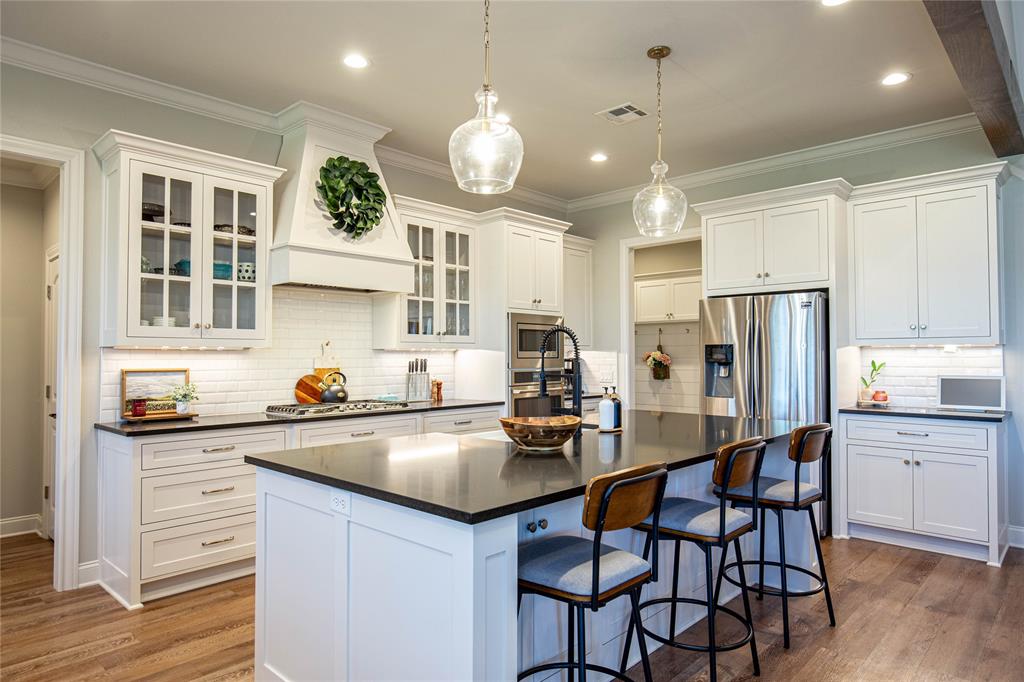 large kitchen includes a large walk-in pantry.