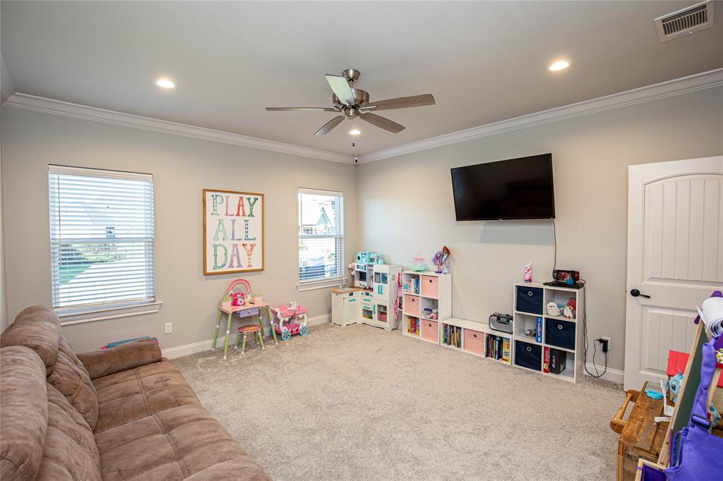 large gameroom overlooks backyard