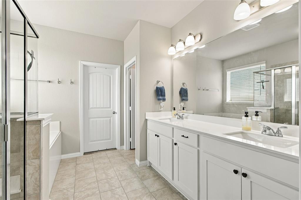 Separate tub and shower and plenty of room for your bathroom items.
