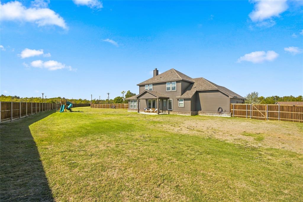 Nearly an acre, surrounded by wooden privacy fence Nearly an acre, surrounded by wooden privacy fence