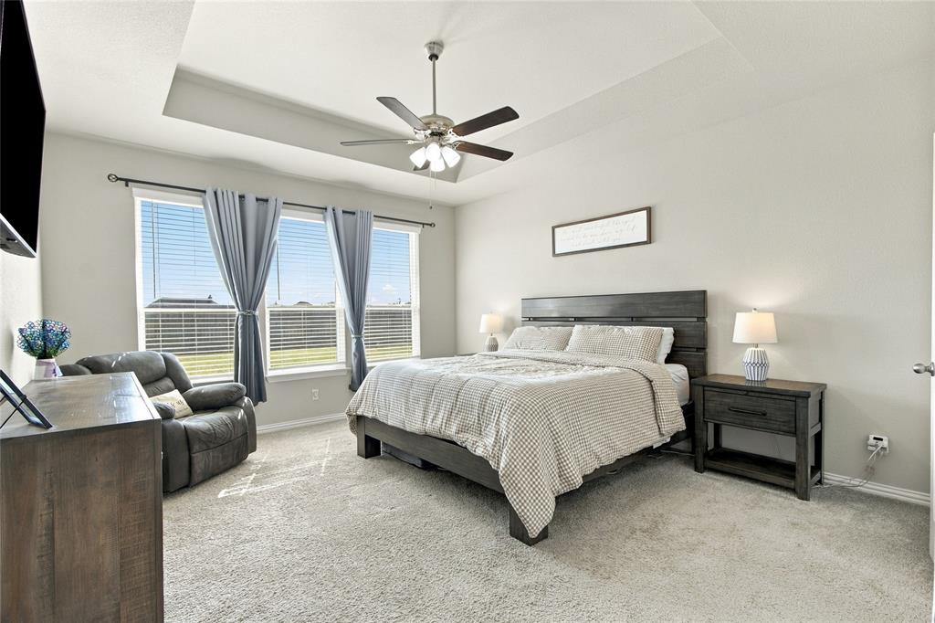 Spacious primary suite, overlooking your estate.