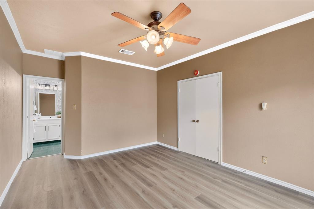Updated ensuite bathroom included in this primary bedroom.