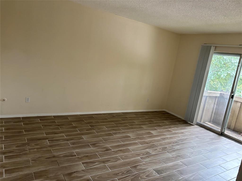 Empty room featuring a textured ceiling Empty room featuring a textured ceiling