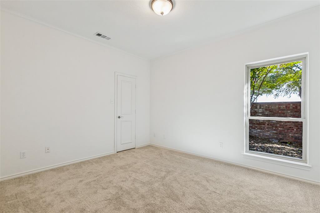 This bedroom is at the north end of the home with a full bath across the hall