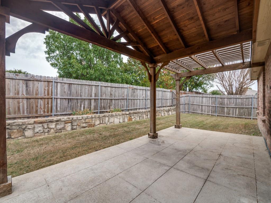 Custom timber-framed outdoor living area with vaulted gabled roof and pergola-style extension
