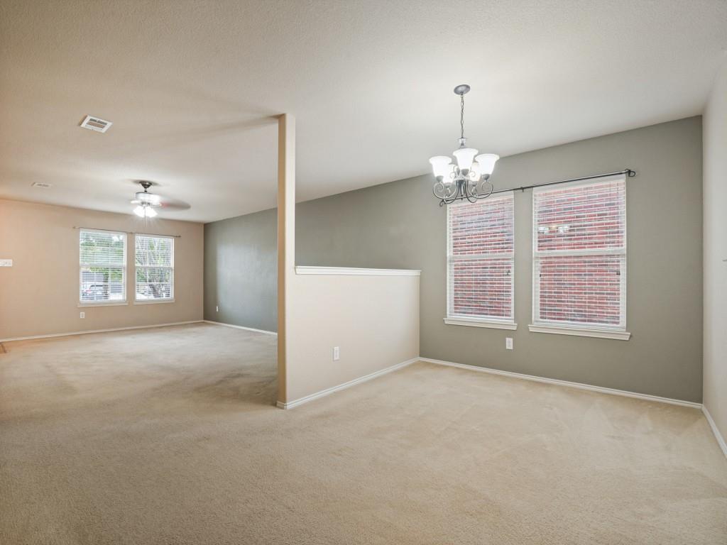 Dedicated dining area conveniently positioned between the living room and kitchen.