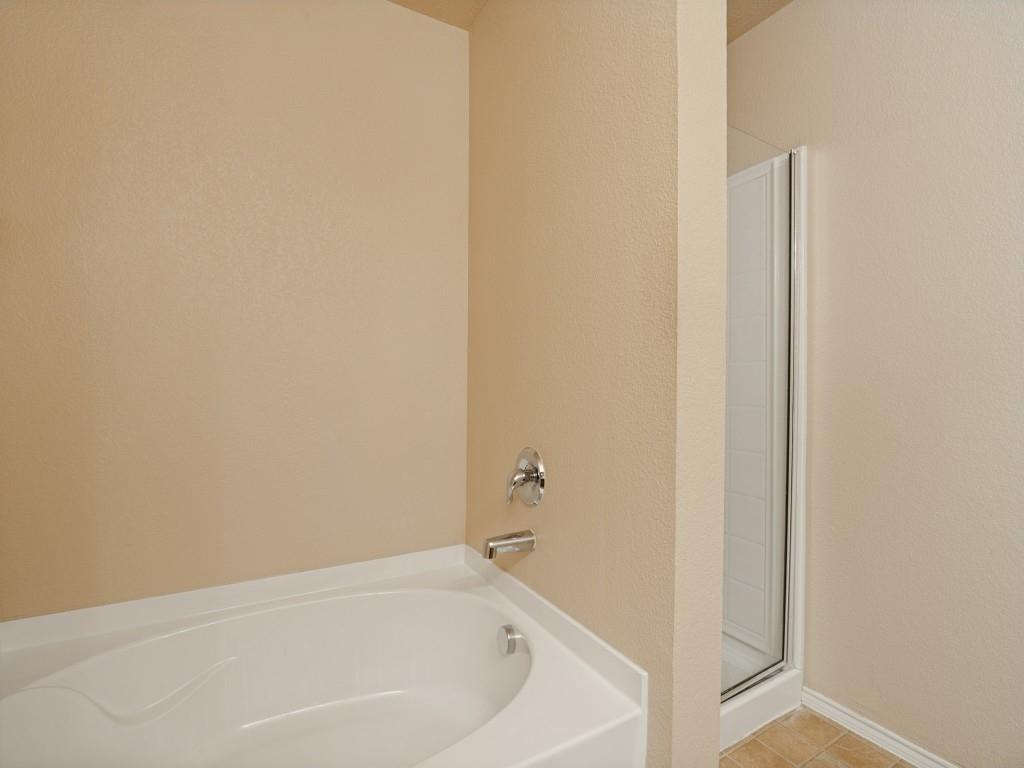 Garden tub and separate shower.