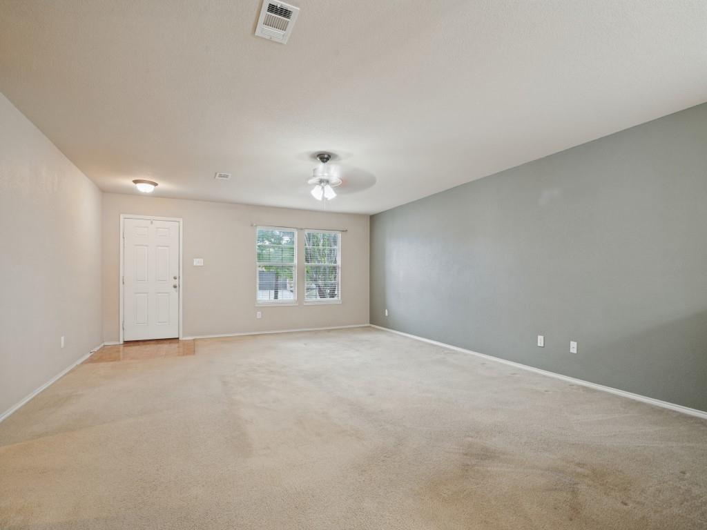 Generously sized living area offering flexibility for relaxing, entertaining or working from home.