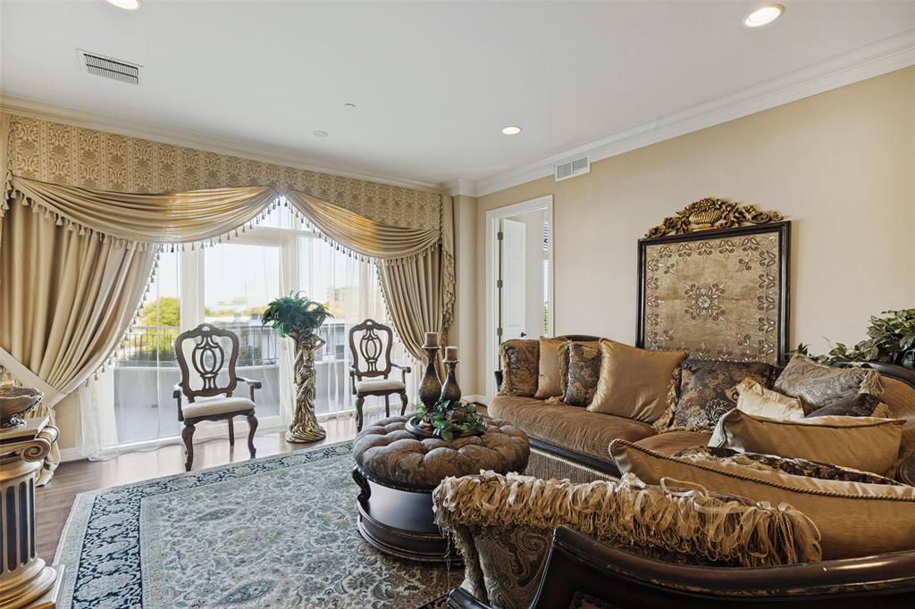 Light & Bright family room with hardwood floors & crown moudling