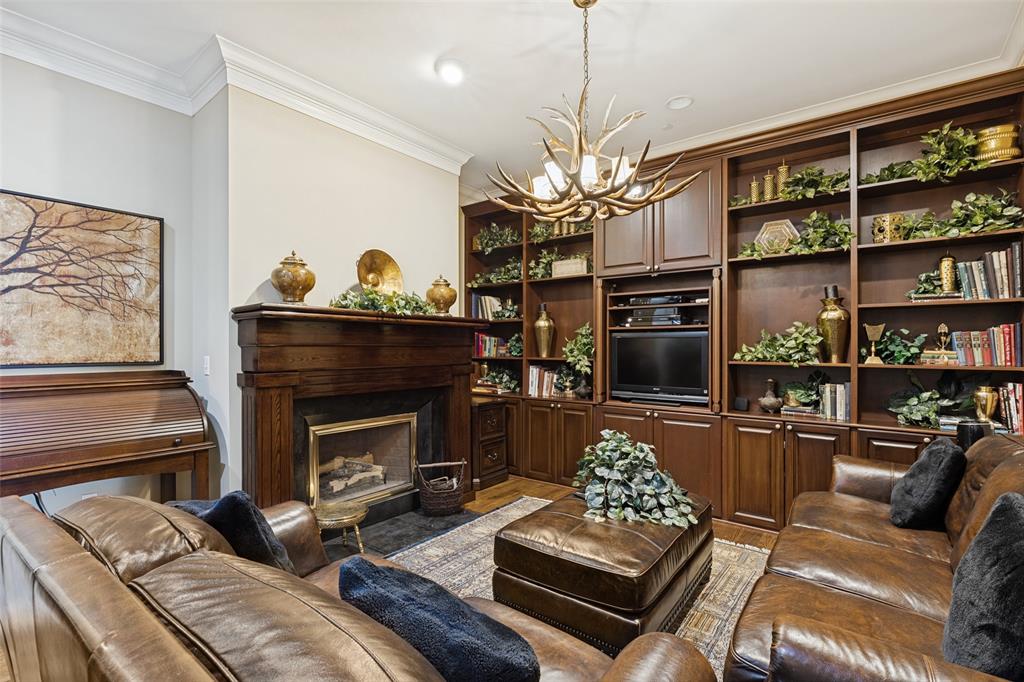 Wood flooring, decorative light fixture & fireplace