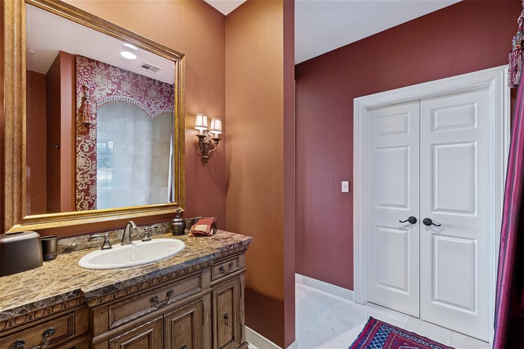 Ensuite bath with custom vanity & walk in closet