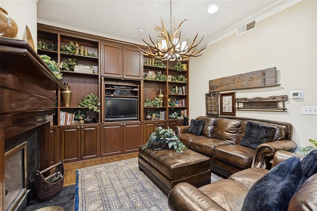 Sophisticated Den would also make a great library with the built ins