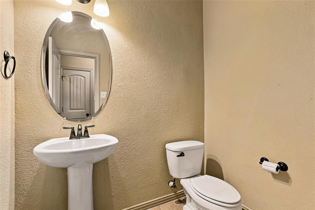 Half bath on first floor for guests.
