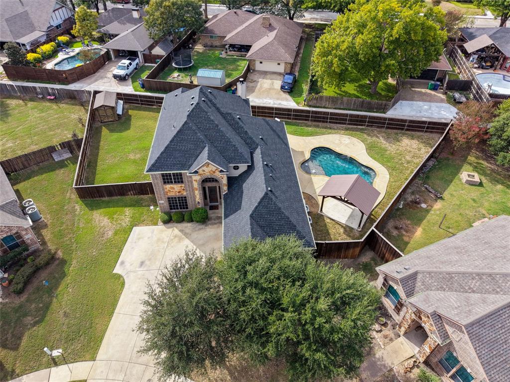 A beautiful home on .27 acres with a pool, storage shed, room to entertain and play!
