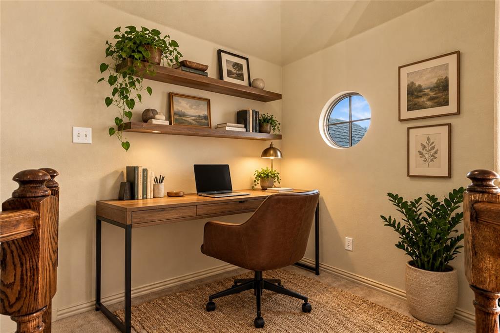 Nook at the top of the stairs is a great flex space for an additional office, studying or a toy area. Virtually staged.