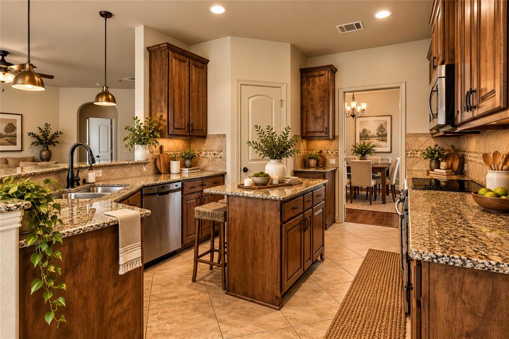 Kitchen with plenty of counter space and storage. Virtually staged.