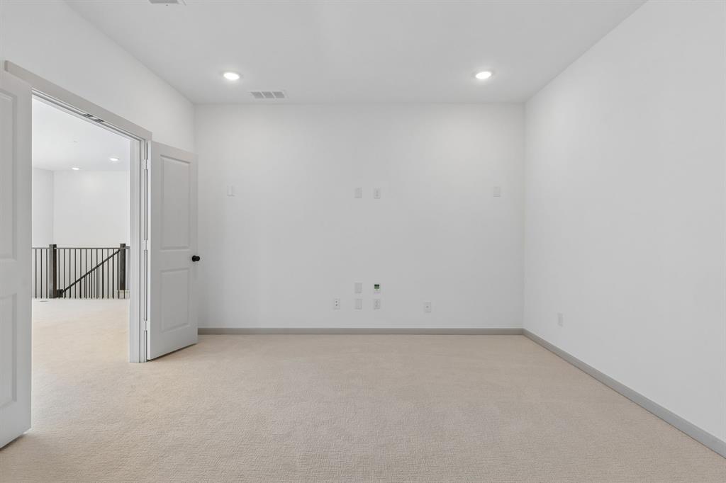 The spacious media room and adjacent game room create the ultimate entertainment zone!
