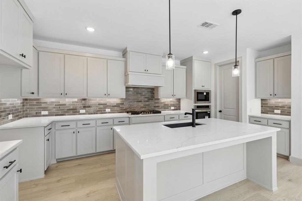 The chef in the family will never be left out of the party in this wonderful home! The chef in the family will never be left out of the party in this wonderful home!