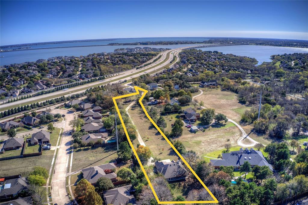 Aerial view of property boundaries highlighted and a view of Lake Ray Hubbard.