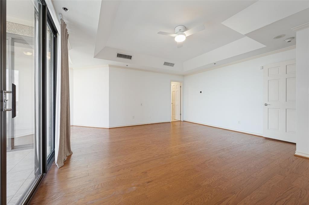 Another view of the primary bedroom