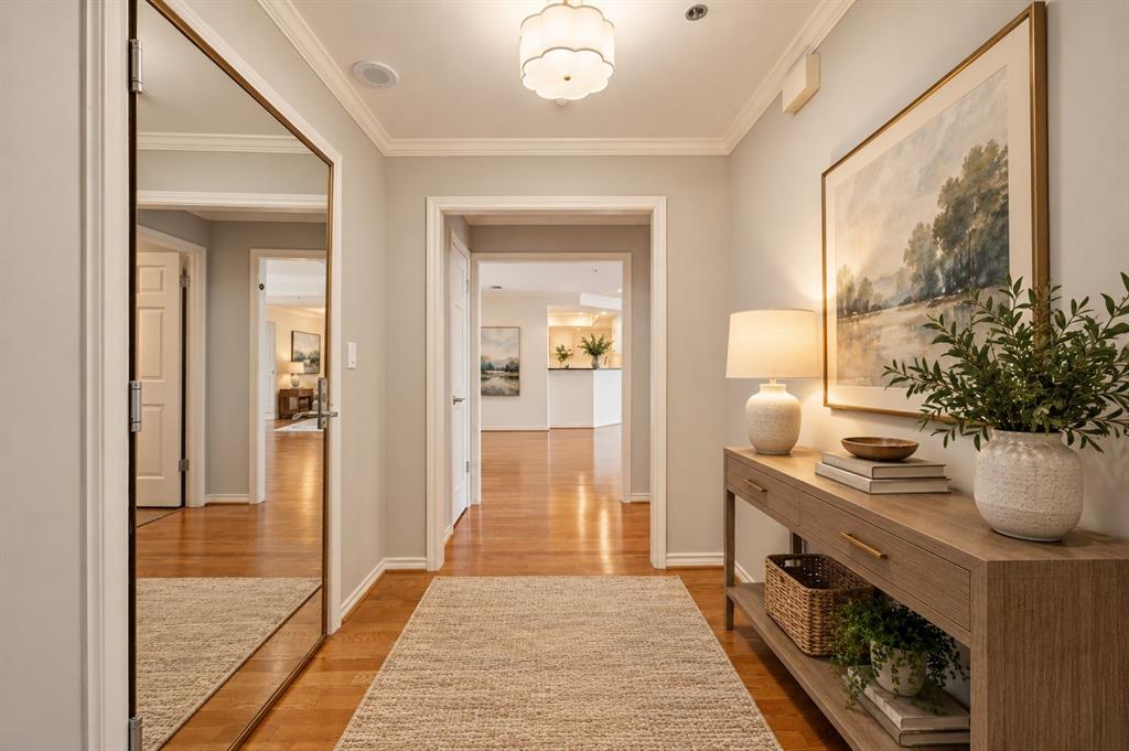 Entryway with mirrored front door - virtually staged