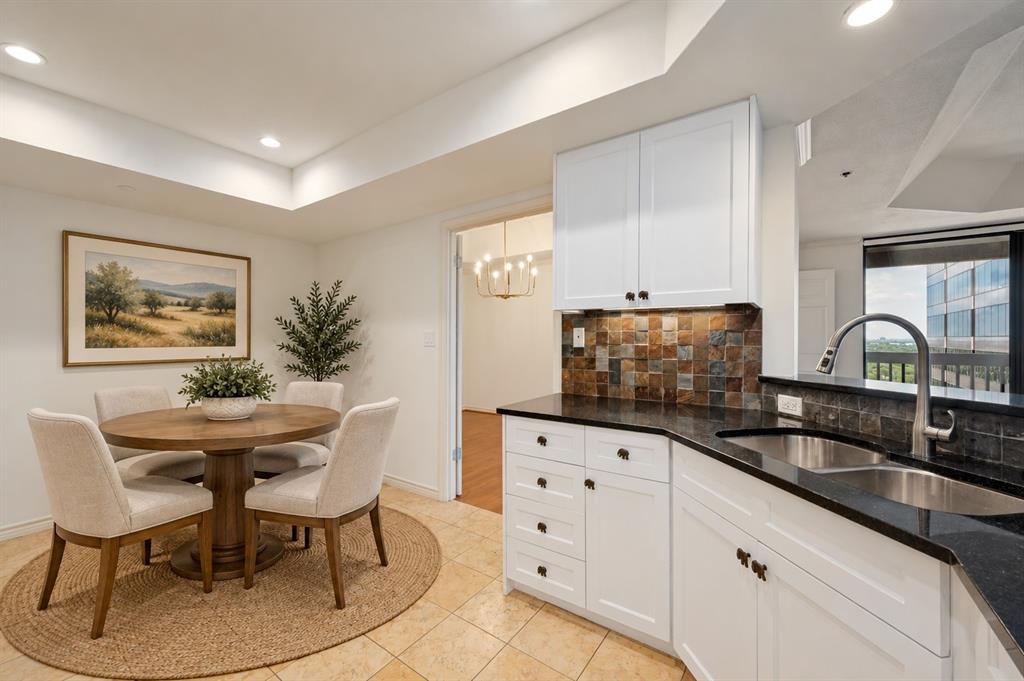 Kitchen with breakfast area - virtually staged