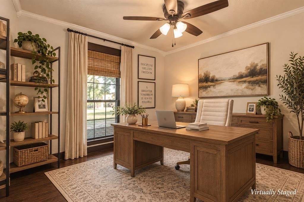 Multi-pane window with dark trim, wood-finish flooring, and a ceiling-mounted light fixture with a fan