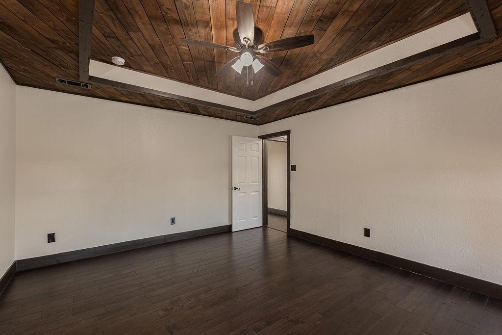 Another view of the primary bedroom