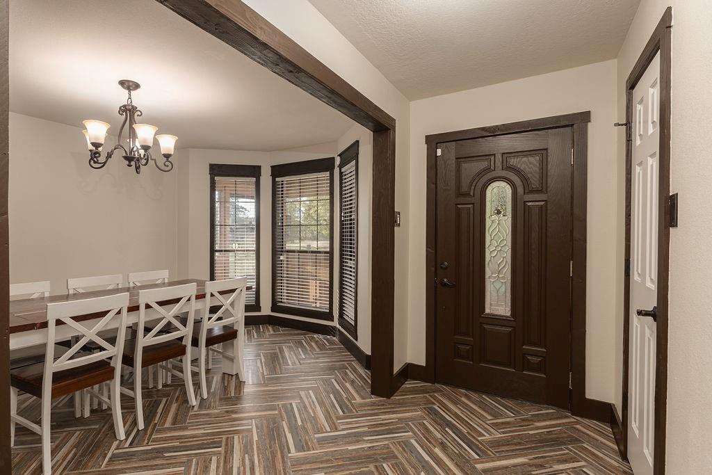 The entryway is open to the dining room