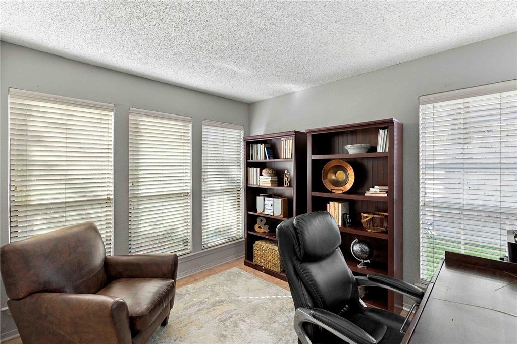 Multi-functional bedroom with ensuite bathroom; currently used as Office.