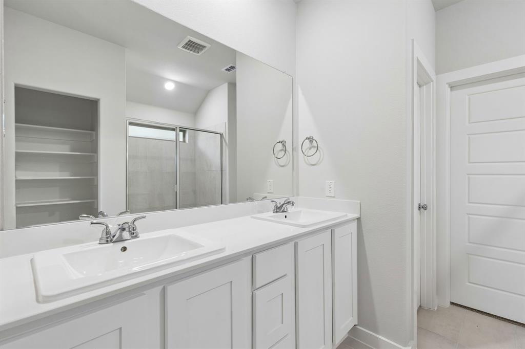 Primary Bathroom in the Oscar home plan – REPRESENTATIVE PHOTO