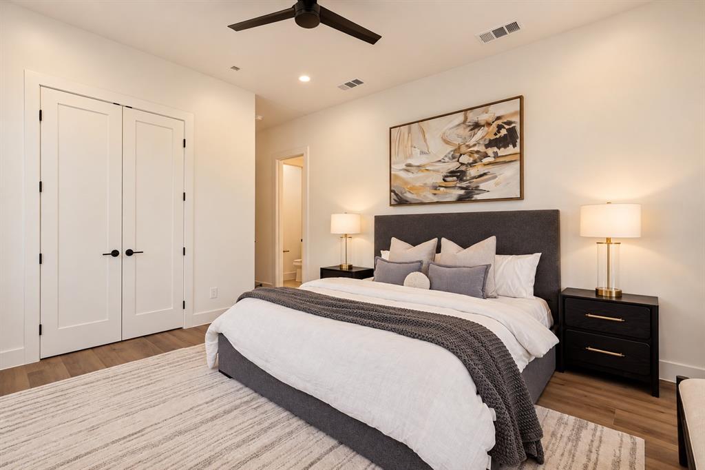 Recessed lighting, ceiling fan, wood-finish flooring, double panel doors, and neutral wall tones