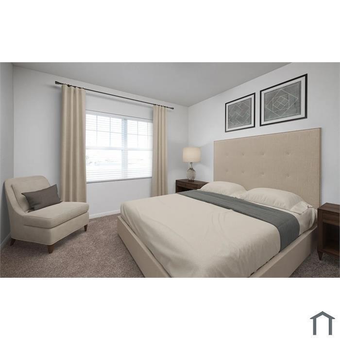 Neutral-toned bedroom featuring carpeting, an adjustable window blind, and a metal curtain rod