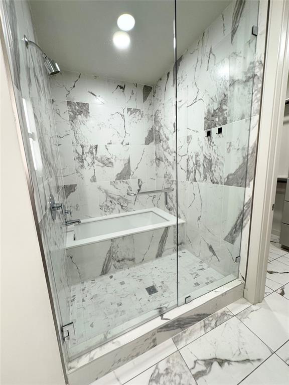 Bathroom featuring independent shower and bath