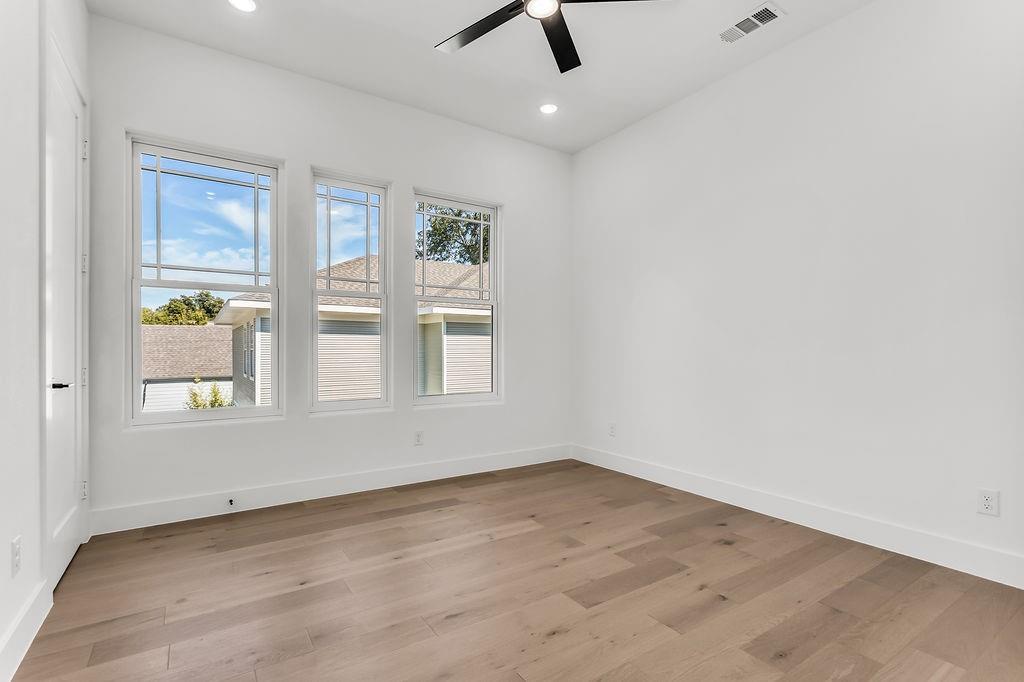 Generously sized secondary bedroom with ample closet space and natural light