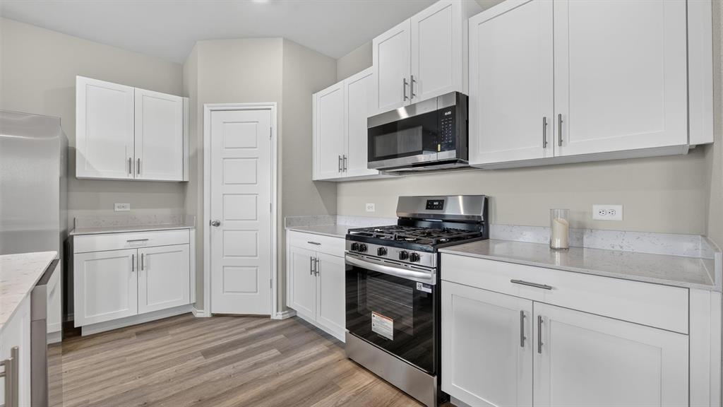 Kitchen - All Home and community information, including pricing, included features, terms, availability and amenities, are subject to change at any time without notice or obligation. All Drawings, pictures, photographs, video, square footages, floor plans, elevations, features, colors and sizes are approximate for illustration purposes only and will vary from the homes as built.