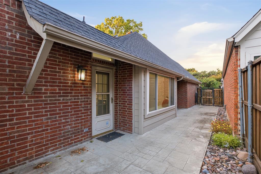 Lantern-lit entries, low-maintenance landscaping and a fully fenced yard make outdoor living simple and private.