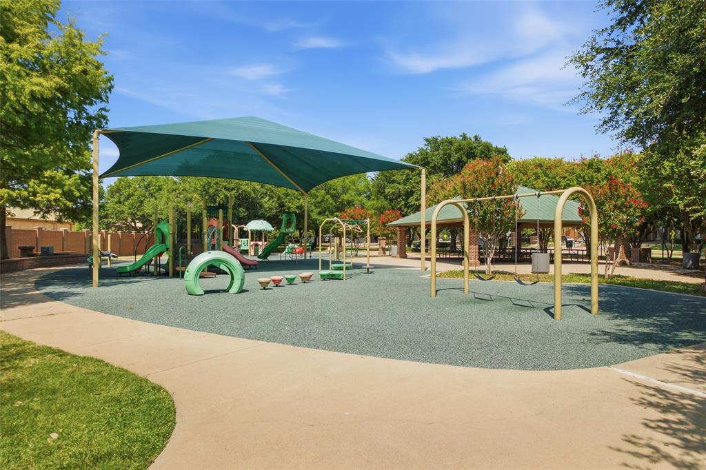 The Les Lacs Park playground is moments away, with shade canopies, swings and walking paths. A neighborhood favorite for families.